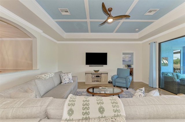 living room featuring light tile patterned floors, ceiling fan, and ornamental molding