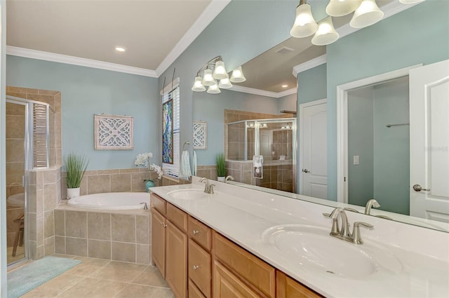 bathroom with tile patterned floors, separate shower and tub, ornamental molding, and an inviting chandelier