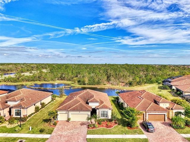 bird's eye view with a water view