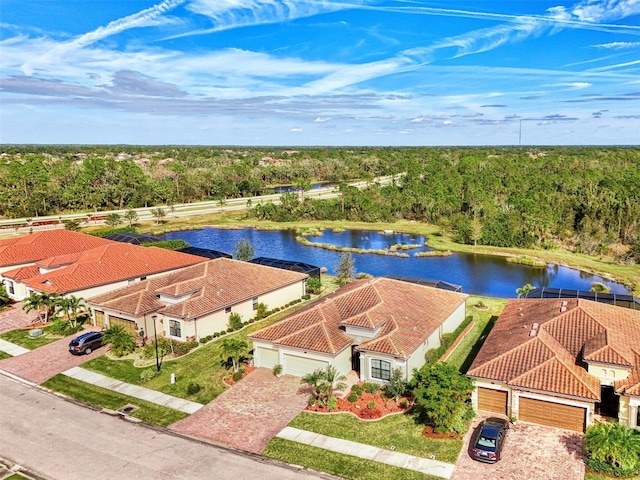 birds eye view of property featuring a water view