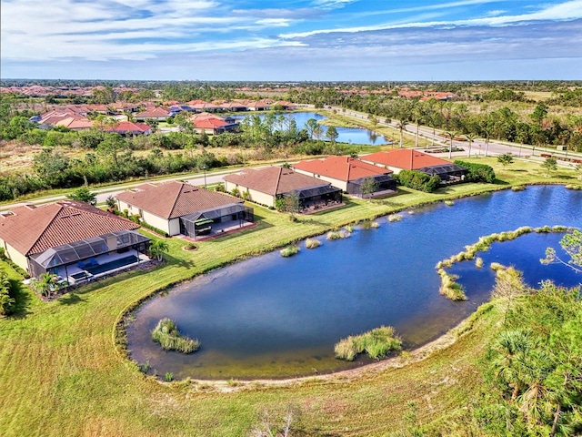 drone / aerial view with a water view