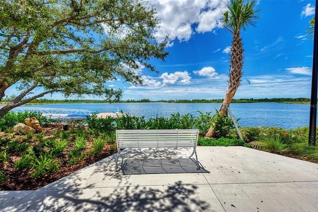 view of patio featuring a water view