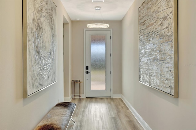 entryway featuring a healthy amount of sunlight and light wood-type flooring