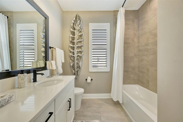 full bathroom featuring tile patterned flooring, shower / bath combination with curtain, toilet, and vanity