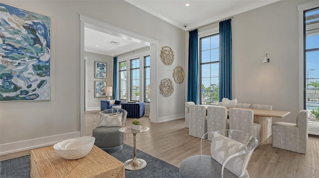 17744 Savory Mist Cir, Bradenton, FL 34211 - sitting room with visible vents, baseboards, ornamental molding, recessed lighting, and wood finished floors