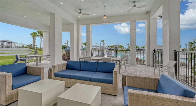 17744 Savory Mist Cir, Bradenton, FL 34211 - view of patio / terrace featuring a water view, outdoor dining area, outdoor lounge area, and ceiling fan