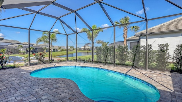 17744 Savory Mist Cir, Bradenton, FL 34211 - outdoor pool featuring a water view, a patio area, a residential view, and a lanai