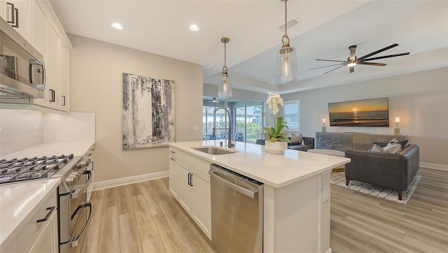 17744 Savory Mist Cir, Bradenton, FL 34211 - kitchen featuring recessed lighting, light wood-style flooring, visible vents, appliances with stainless steel finishes, and a sink