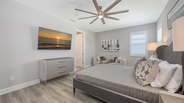 17744 Savory Mist Cir, Bradenton, FL 34211 - bedroom featuring light wood-style floors, baseboards, a ceiling fan, and visible vents
