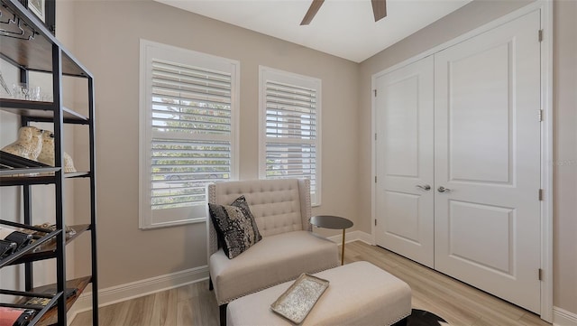 17744 Savory Mist Cir, Bradenton, FL 34211 - sitting room with light wood finished floors, baseboards, and ceiling fan