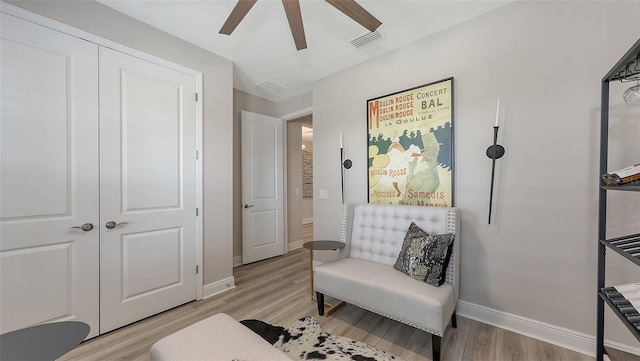 17744 Savory Mist Cir, Bradenton, FL 34211 - sitting room featuring light wood-style flooring, baseboards, a ceiling fan, and visible vents