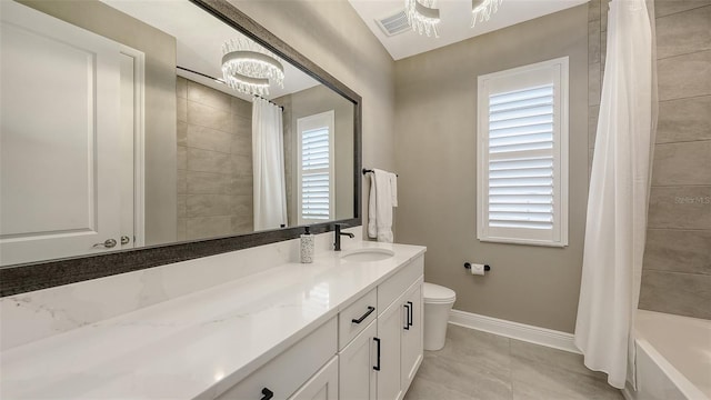 17744 Savory Mist Cir, Bradenton, FL 34211 - bathroom featuring an inviting chandelier, vanity, visible vents, toilet, and baseboards