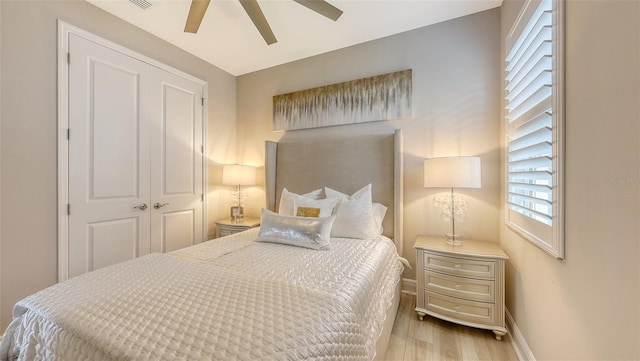 17744 Savory Mist Cir, Bradenton, FL 34211 - bedroom with baseboards, a ceiling fan, and wood finished floors