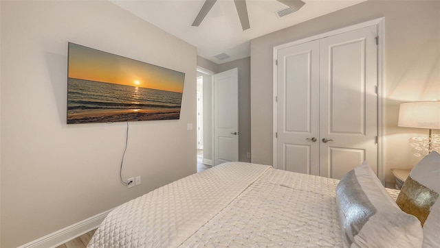 17744 Savory Mist Cir, Bradenton, FL 34211 - bedroom featuring wood finished floors, baseboards, a closet, and visible vents
