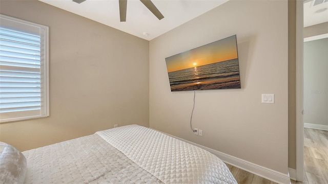 17744 Savory Mist Cir, Bradenton, FL 34211 - bedroom featuring baseboards, light wood finished floors, and ceiling fan
