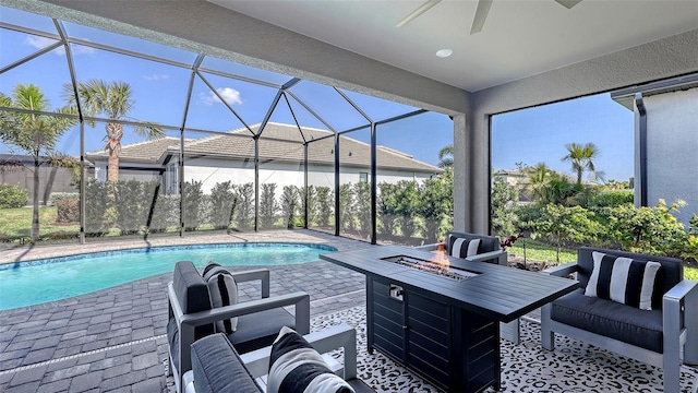 17744 Savory Mist Cir, Bradenton, FL 34211 - exterior space featuring a patio area, glass enclosure, and an outdoor living space with a fire pit