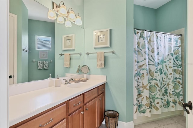 bathroom with vanity, tile patterned flooring, and shower / bath combo