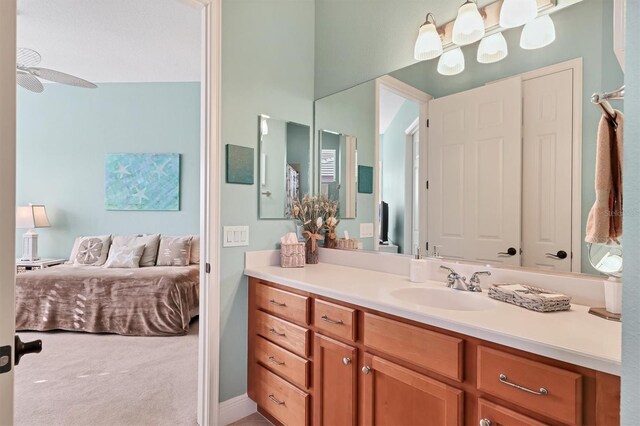 bathroom with vanity and ceiling fan