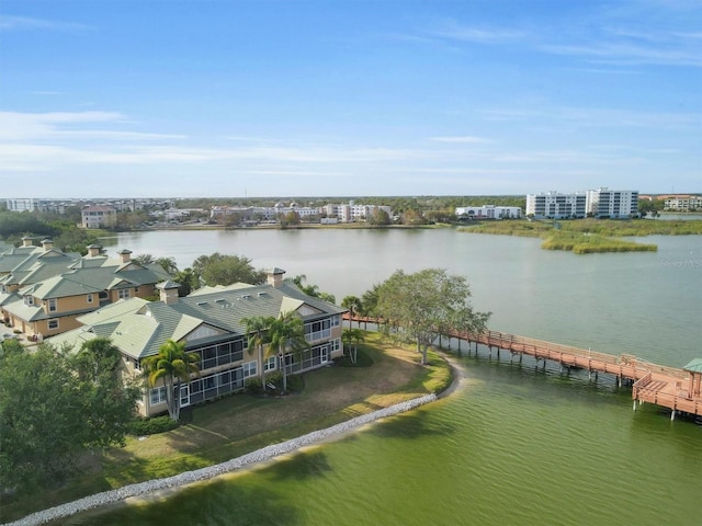 drone / aerial view with a water view