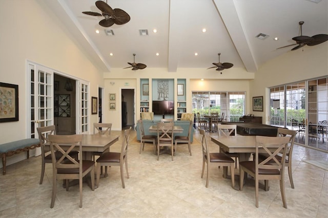 dining space featuring ceiling fan, beam ceiling, and high vaulted ceiling