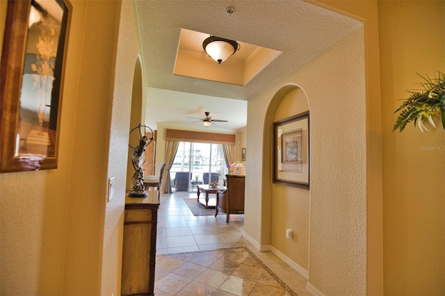 corridor featuring light tile patterned flooring