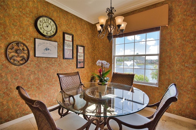 tiled dining room featuring a water view, ornamental molding, and a notable chandelier