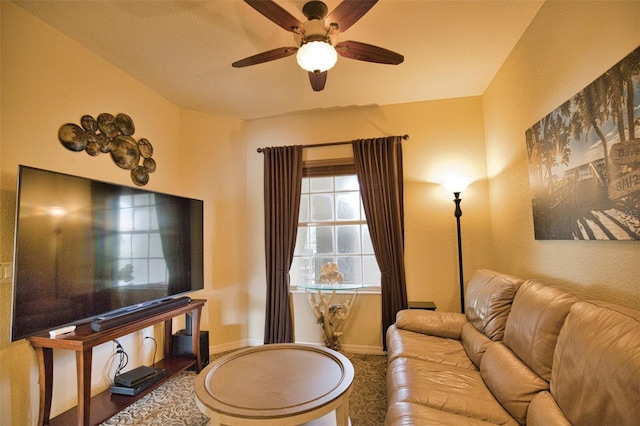 living room featuring ceiling fan