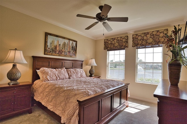 bedroom featuring ceiling fan, light colored carpet, and crown molding