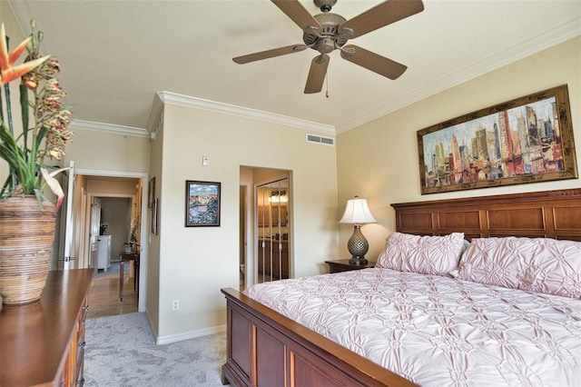 carpeted bedroom with ceiling fan, ornamental molding, ensuite bathroom, and a closet