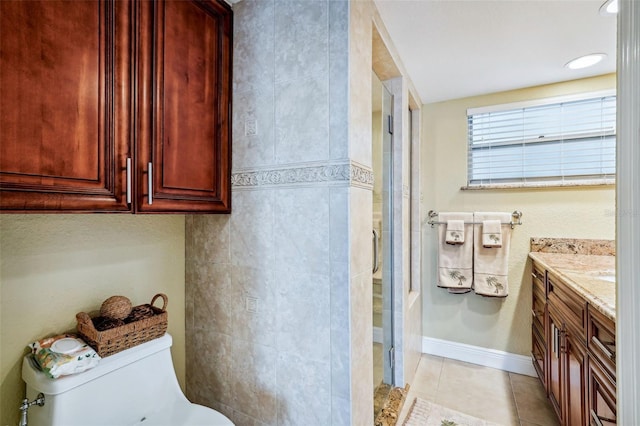 4430 Exeter Dr Unit M108, Longboat Key, FL 34228 - bathroom with a shower stall, vanity, and tile patterned flooring