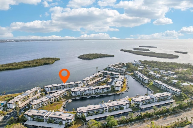 birds eye view of property featuring a water view