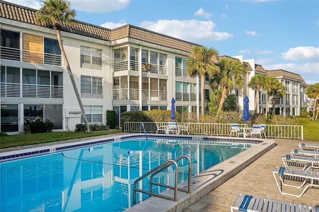 view of pool featuring a patio area