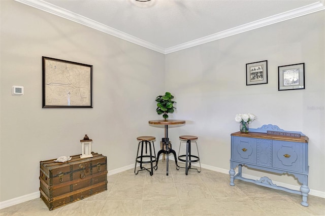 miscellaneous room with light tile patterned floors and crown molding