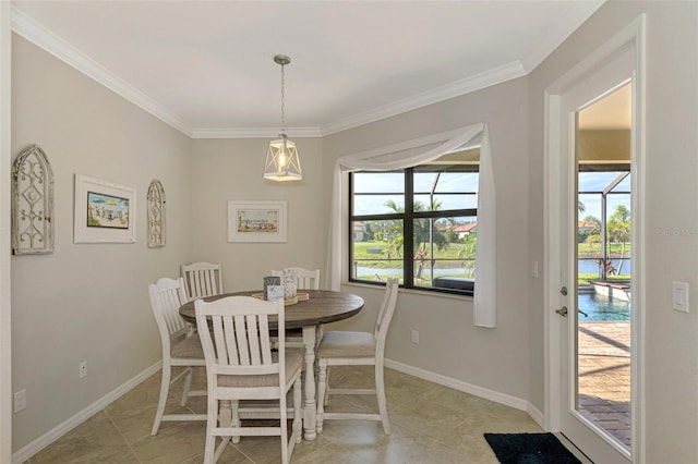 dining area featuring light tile patterned floors and ornamental molding