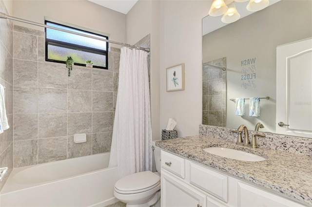 full bathroom with toilet, vanity, and shower / tub combo with curtain