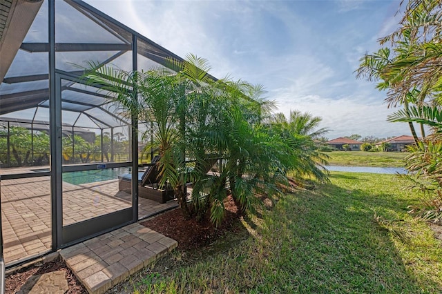 exterior space with a lanai and a patio area