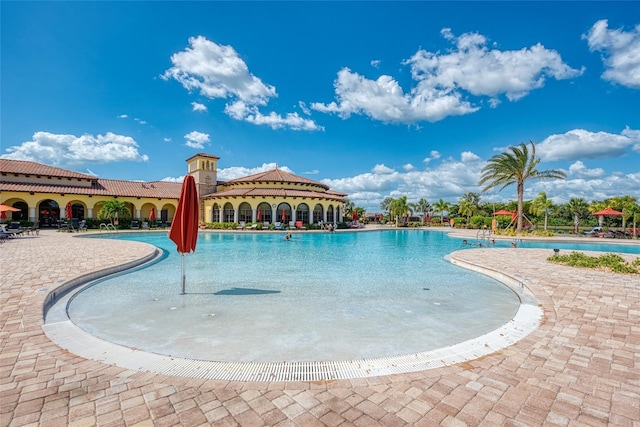 view of pool featuring a patio area