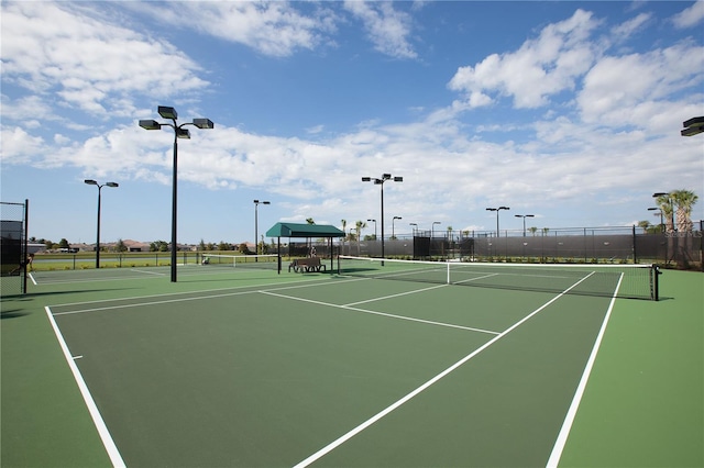 view of tennis court with basketball court