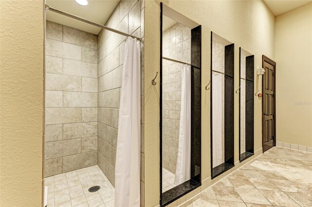 bathroom with a shower with shower curtain