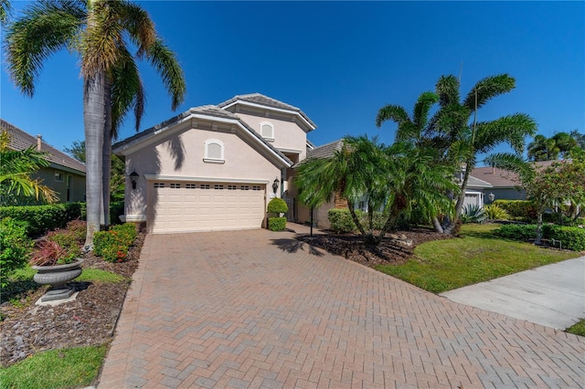 view of front of property with a garage