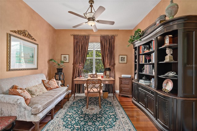 office featuring hardwood / wood-style floors and ceiling fan