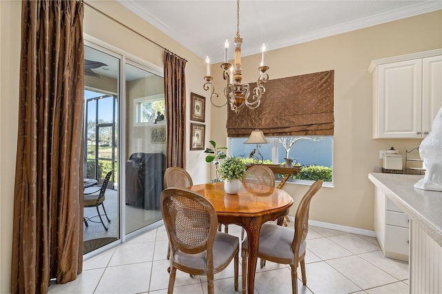 tiled dining area with crown molding and a notable chandelier