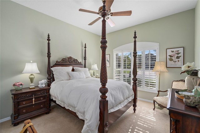 bedroom featuring ceiling fan and light carpet