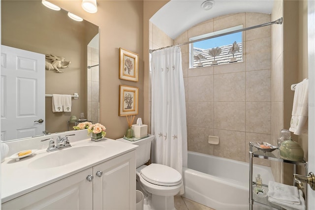 full bathroom featuring vanity, tile patterned flooring, shower / bathtub combination with curtain, and toilet