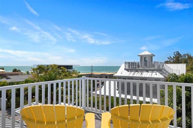 balcony featuring a water view