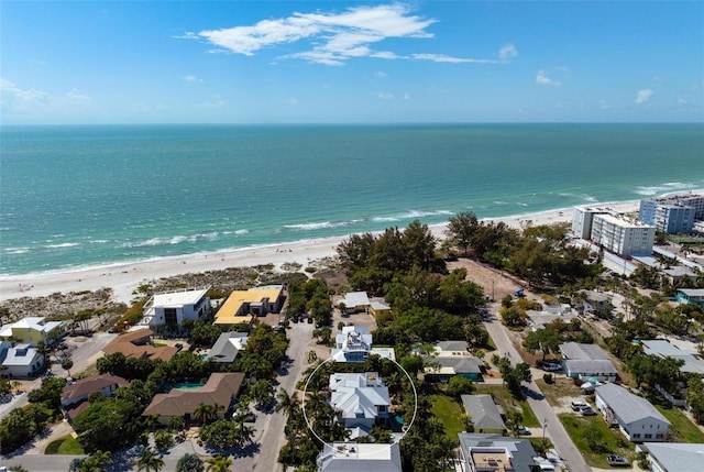 bird's eye view with a water view and a view of the beach