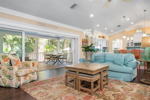 living room featuring ceiling fan, dark wood-type flooring, crown molding, vaulted ceiling, and wood ceiling