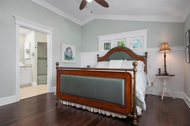 bedroom featuring hardwood / wood-style floors, ceiling fan, lofted ceiling, and ensuite bath