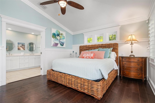 bedroom with connected bathroom, ceiling fan, wood-type flooring, and ornamental molding