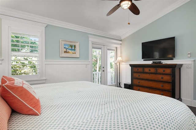 bedroom featuring ceiling fan, lofted ceiling, access to outside, and multiple windows